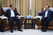 The Secretary for Innovation and Technology, Mr Nicholas W Yang (left), pays a courtesy call on the Deputy Director of the Hong Kong and Macao Affairs Office of the State Council, Mr Zhou Bo (right), this morning (January 21).