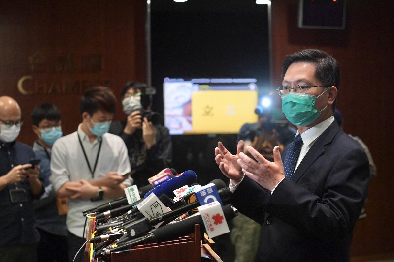 The Secretary for Innovation and Technology, Mr Alfred Sit, responds to media questions at the Legislative Council Complex today (April 23).