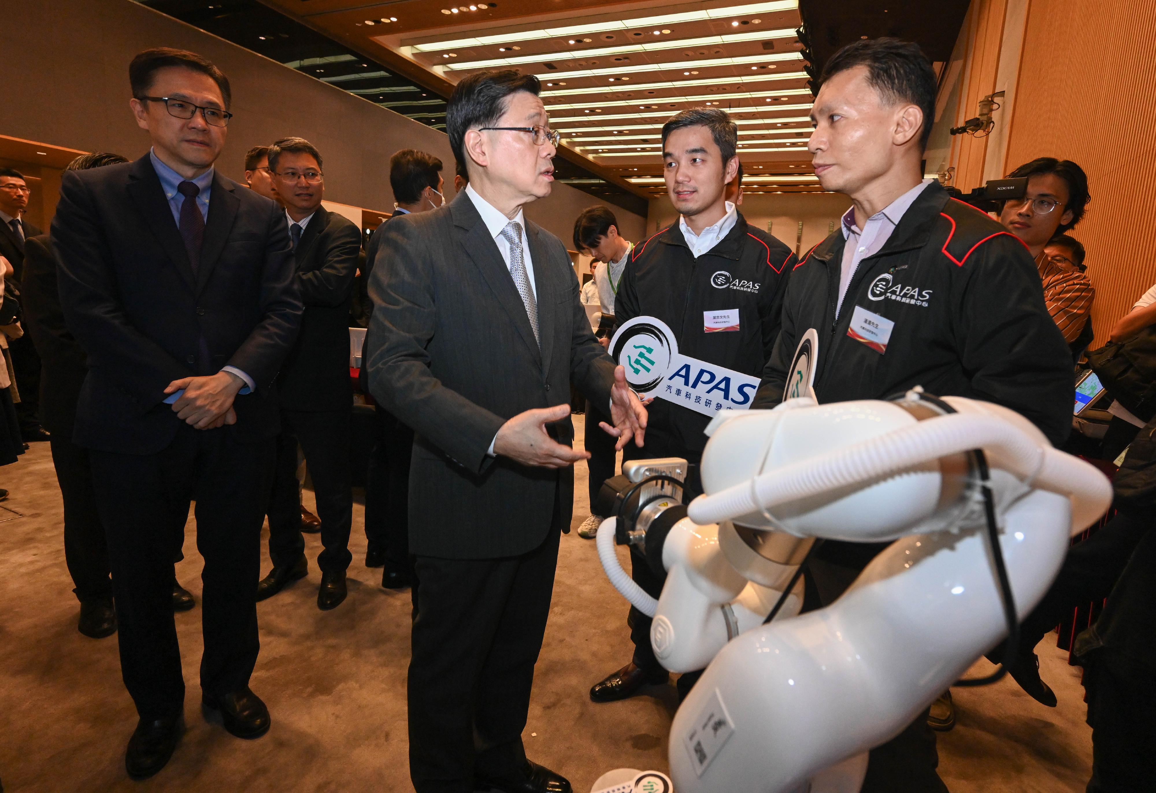 The Chief Executive, Mr John Lee, attended the Reception for I&T Awards 2024 today (July 15). Photo shows Mr Lee (second left) touring the winning projects showcase. Looking on is the Secretary for Innovation, Technology and Industry, Professor Sun Dong (first left).
